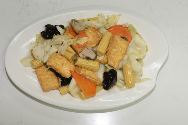 Stir-Fried Tofu with Baby Corn and Mushrooms.